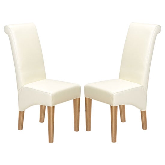 Modals Beige Leather Dining Chairs In A Pair With Wooden Legs